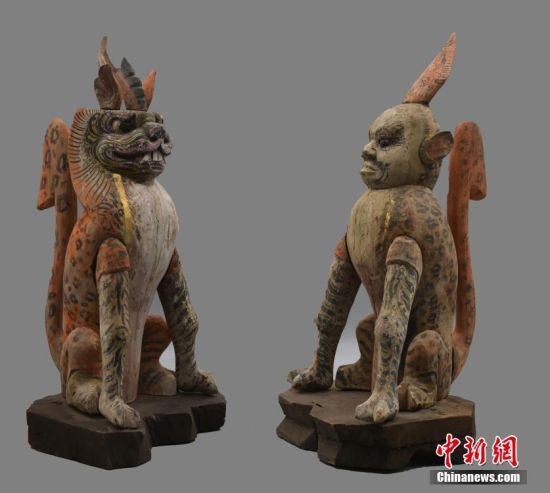 圖為慕容智墓出土鎮(zhèn)墓獸。 中新社發(fā) 甘肅省文物局 供圖